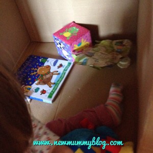 Cardboard box den for toddlers