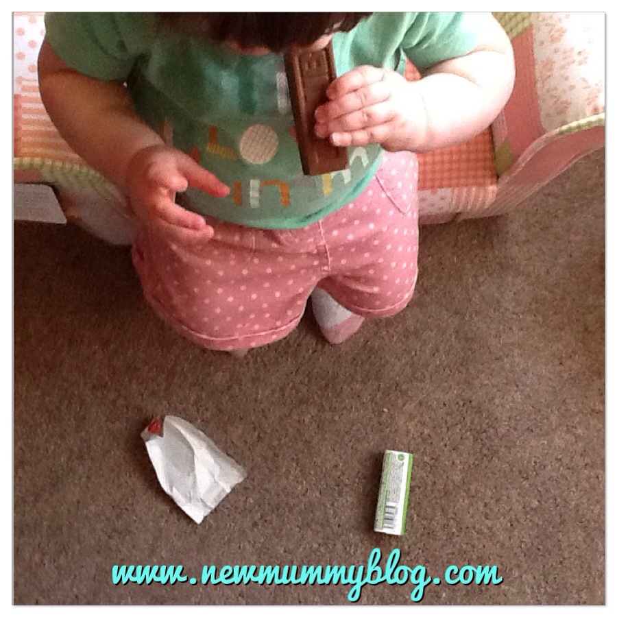 Toddler took a chocolate bar from the cupboard and ate it 