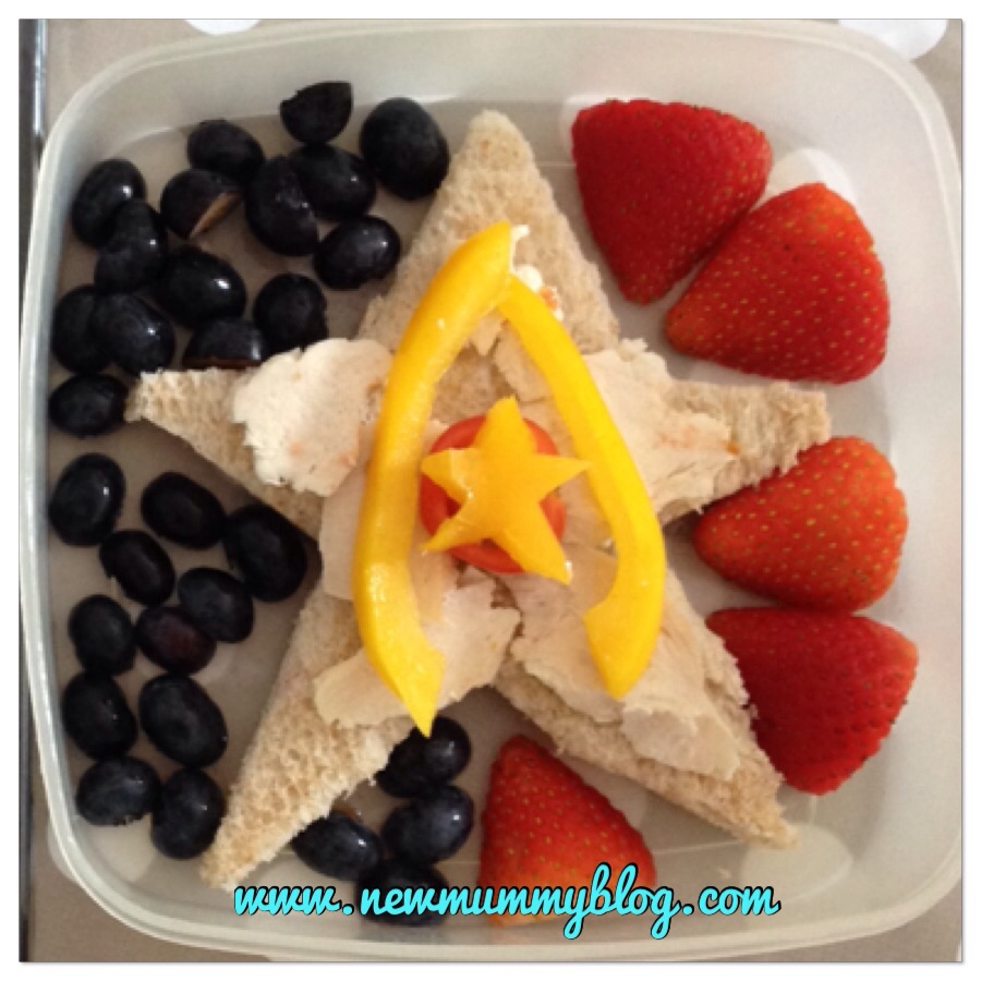 captain america theme healthy lunch blueberries strawberries star surround a star sandwich