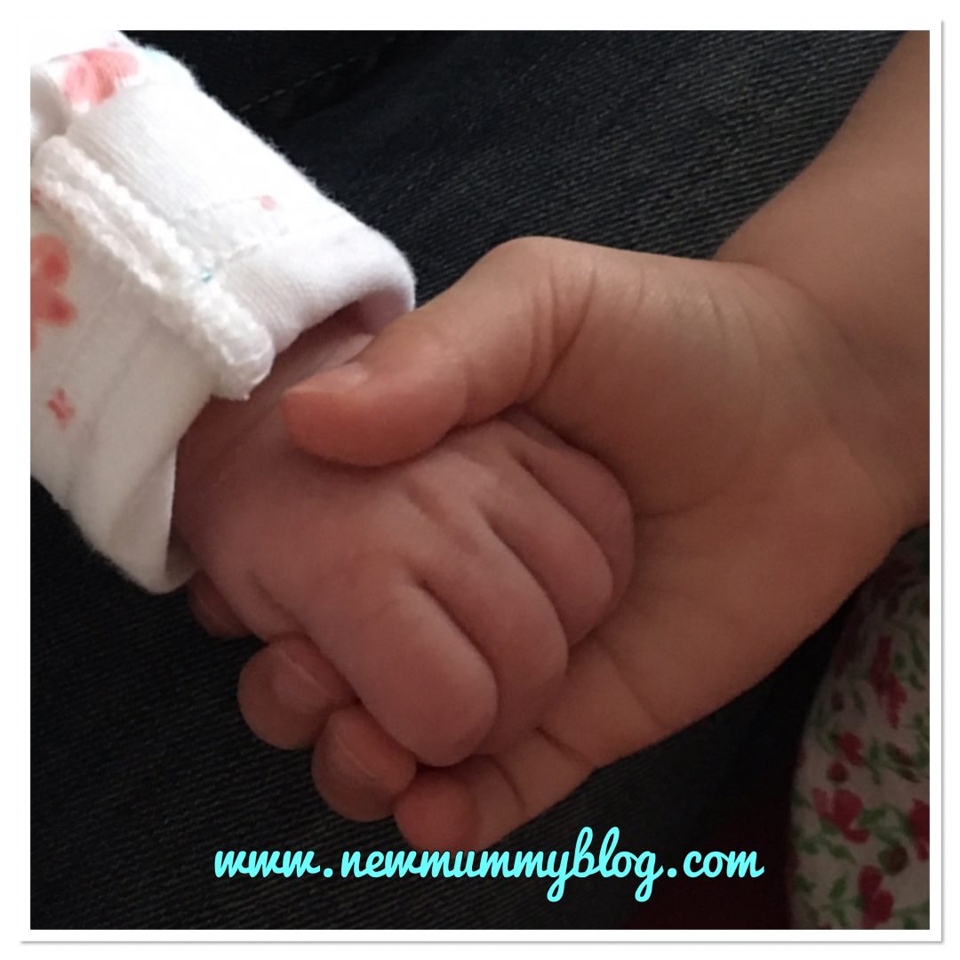 Siblings holding hands newborn and toddler NewMummyBlog