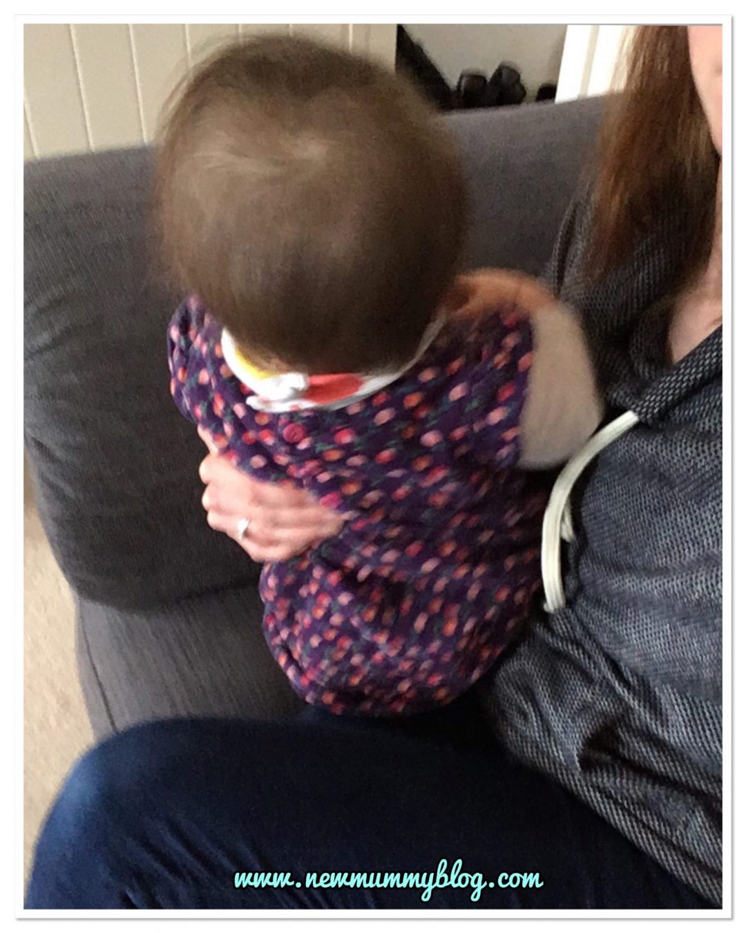 Baby distracted by a noise during breastfeeding. Sittingbolt upright. The challenge of feeding a 9 month old who sits, crawls and wants to be involved! 