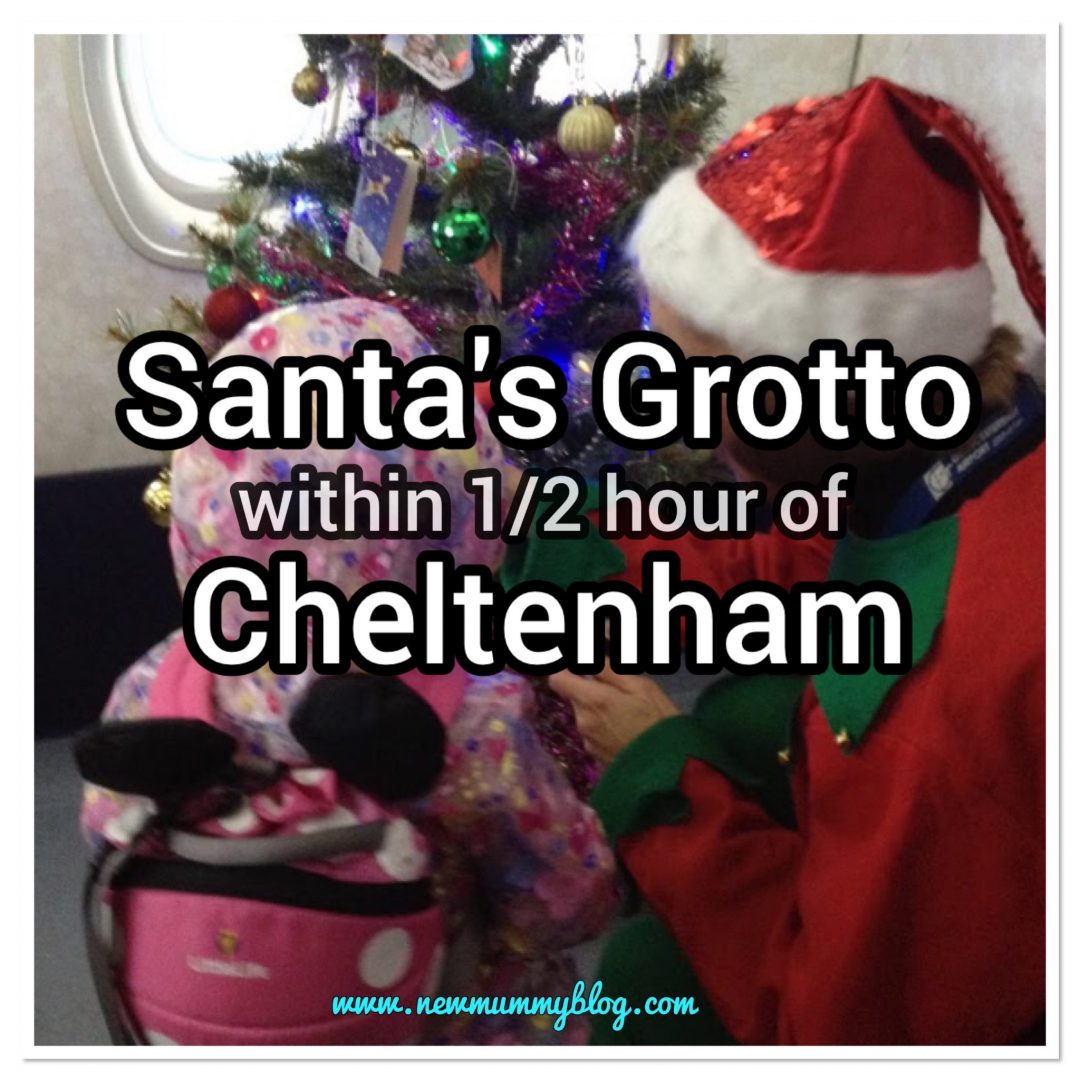 Santa's Grotto near Cheltenham Gloucestershire - Father Christmas Elf decorate christmas tree