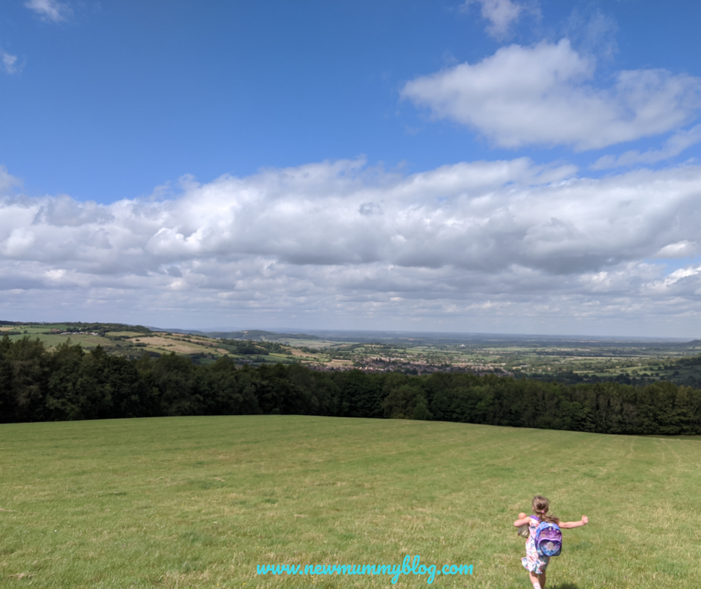 Family Walks near Cheltenham Gloucestershire , view of Winchcombe from Bela's Knap walk. Days out and things to do with the kids near cheltenham